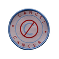 Round patch with 'Cancel Cancer' text and a no-circle symbol on a white background