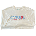 White crop top with 'CANCERL' text on a white background