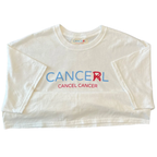White crop top with 'CANCERL' text on a white background