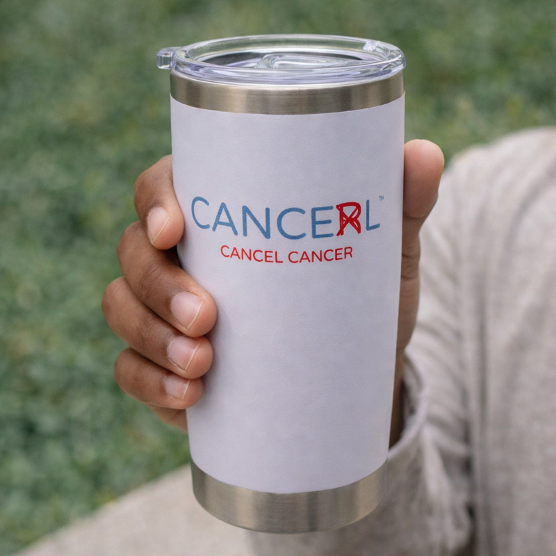 White tumbler with 'CANCERL' logo held by a person outdoors